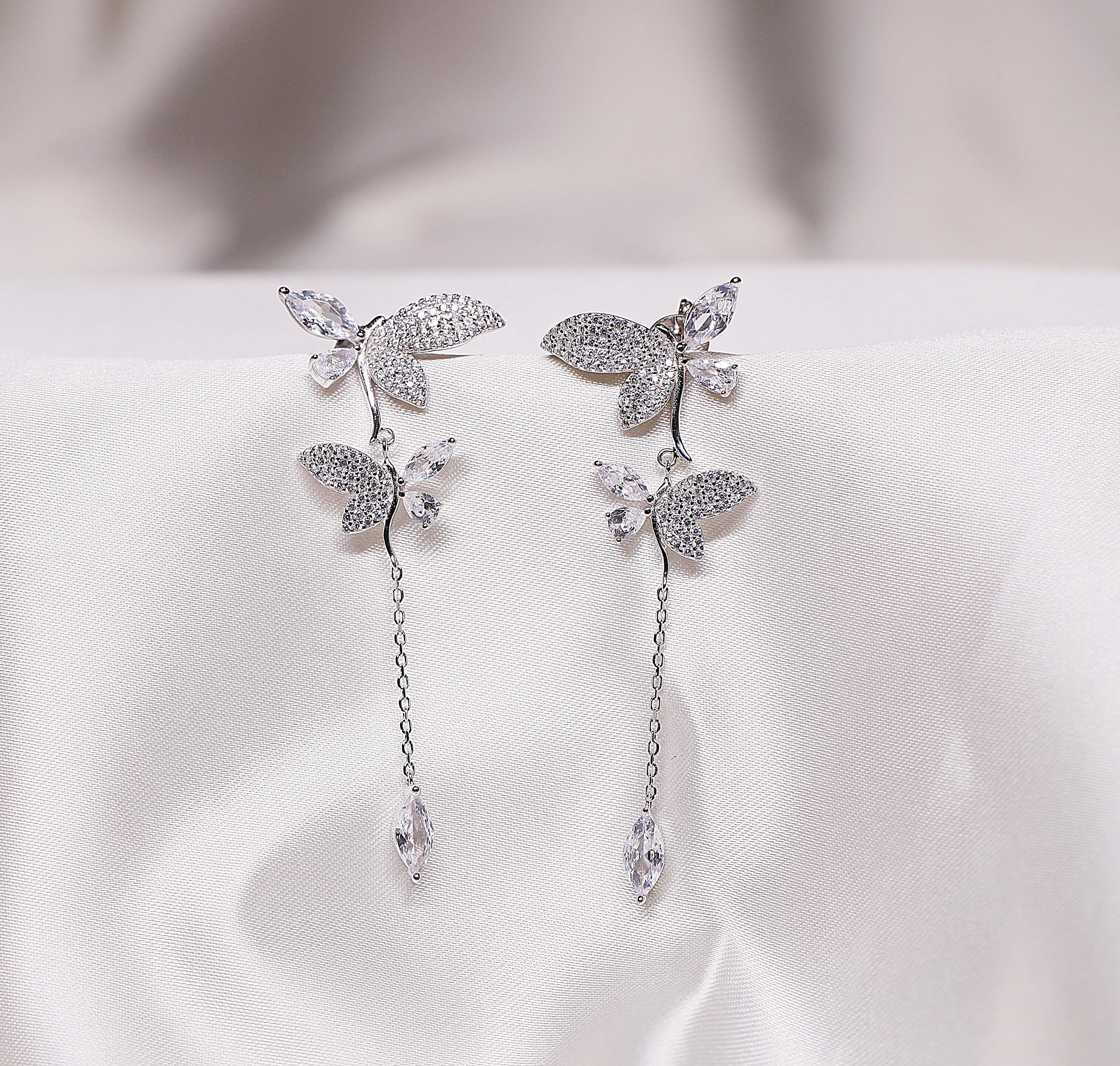 Silver butterfly dangle earrings